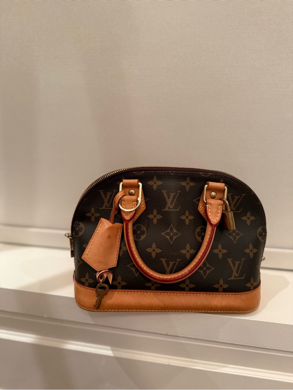 Louis Vuitton Brown Monogram Alma BB with Natural Leather Trim